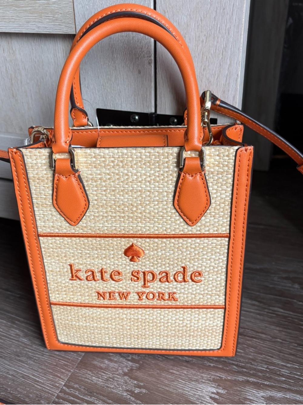 NWT - Kate Spade Ellie Mini Straw Bag -
Orange Zin